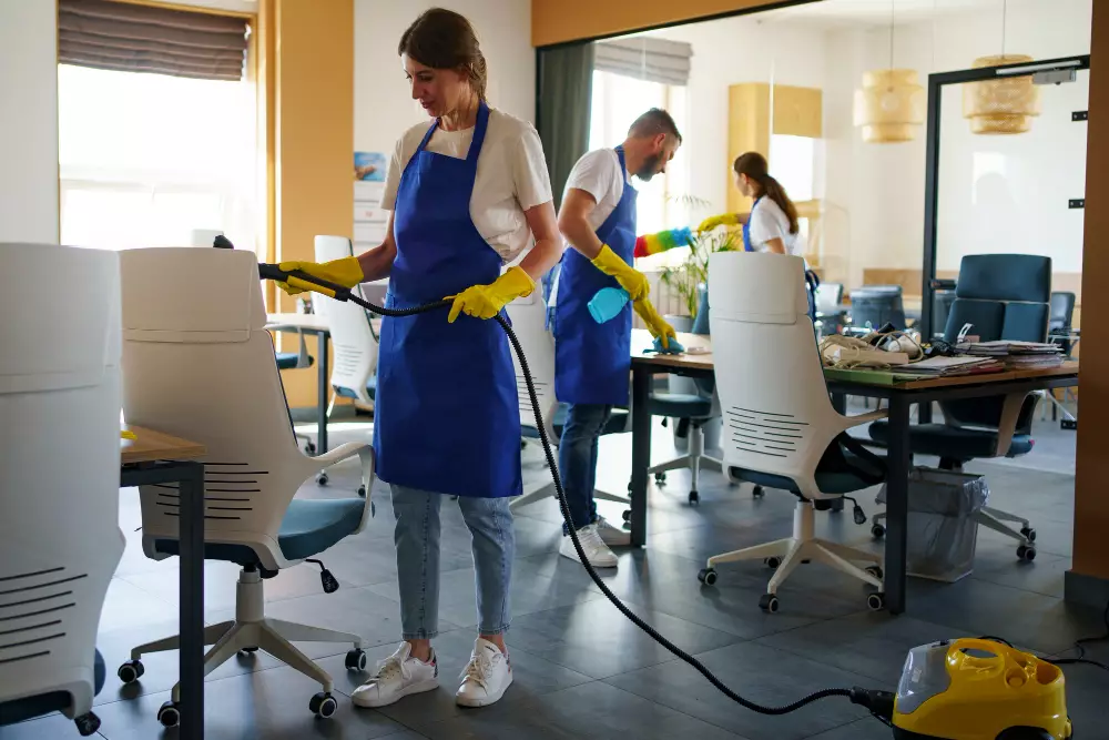 Professional home cleaner vacuuming a living room in Adelaide